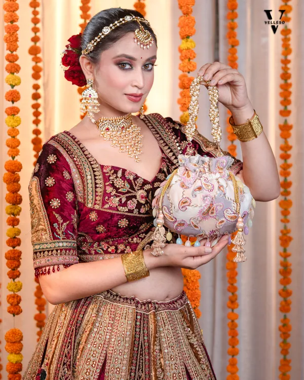 Sitara_Round_Potli_Bag_with_Pastel_Paisley_Embroidery_&_Pearl_Handle